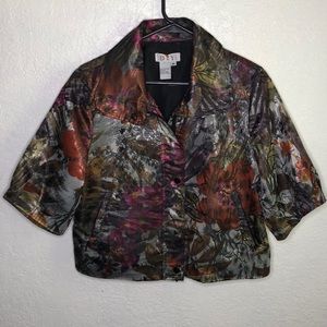 Multicolor women's blazer with zipper pockets.